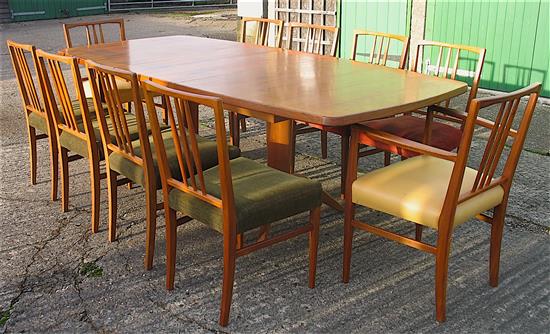 Gordon Russell, extending teak dining table with ten chairs including two carvers W.230cm